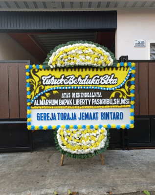 Papan Bunga Duka di Pamanuk